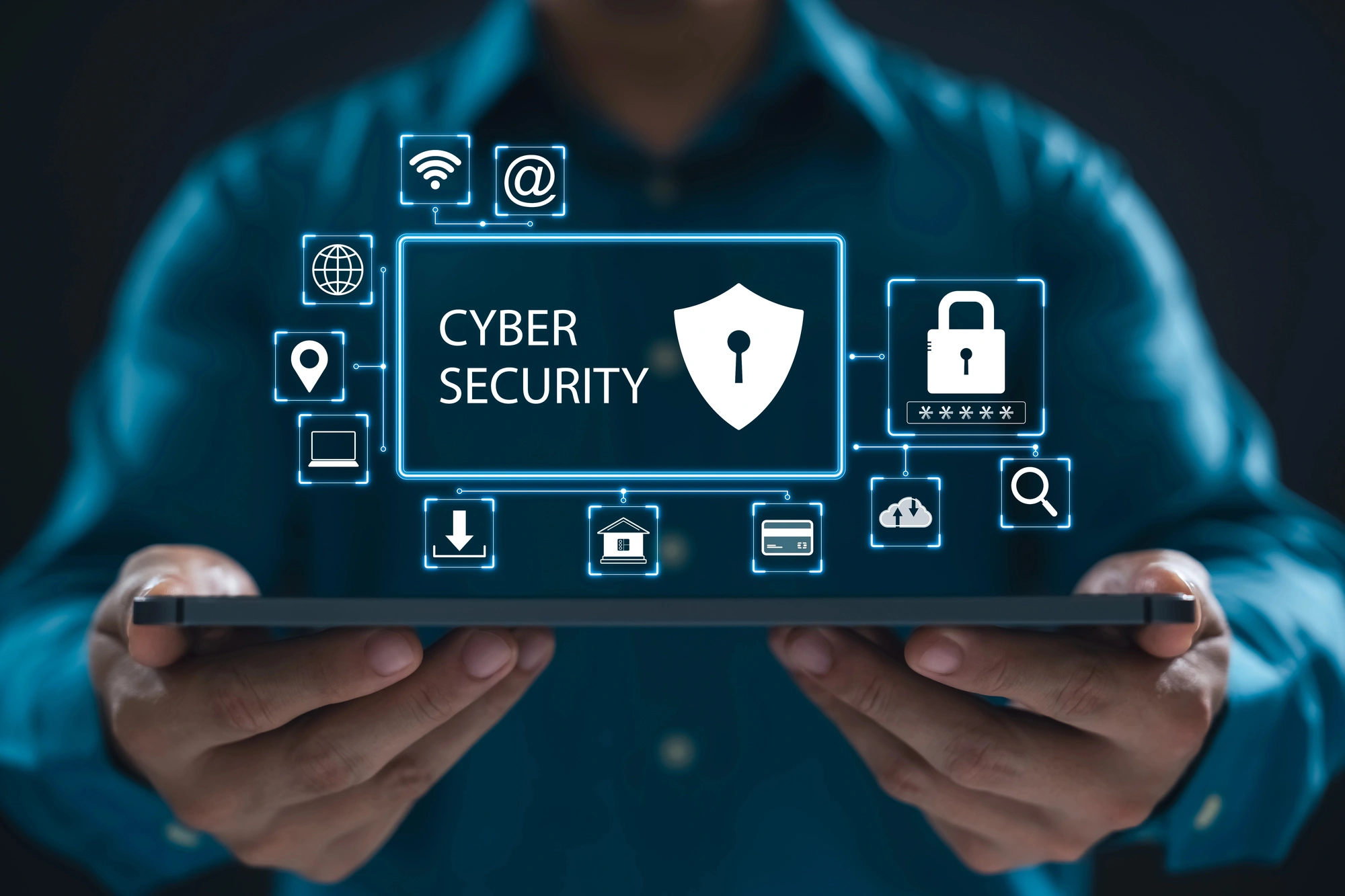 Hands holding a tablet with glowing cyber security icons and a shield, illustrating digital protection of data.