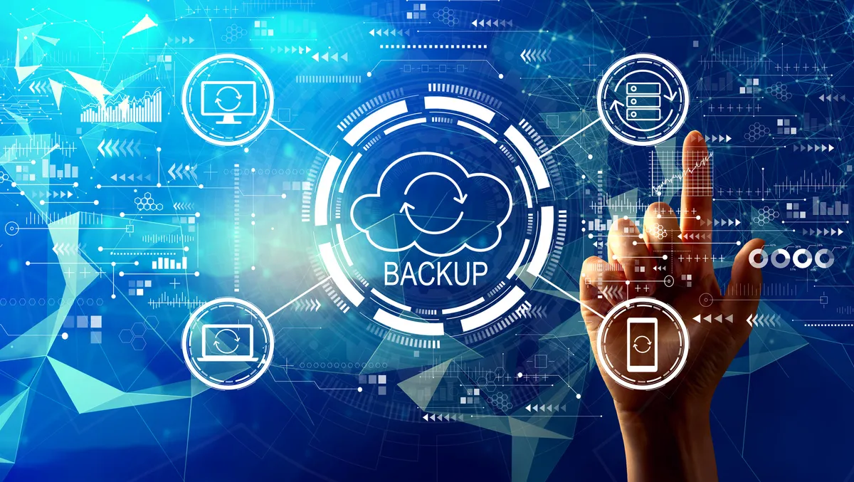 Illustration of cloud backup concept with a hand pointing to circular icons representing devices and data networks in blue tones.